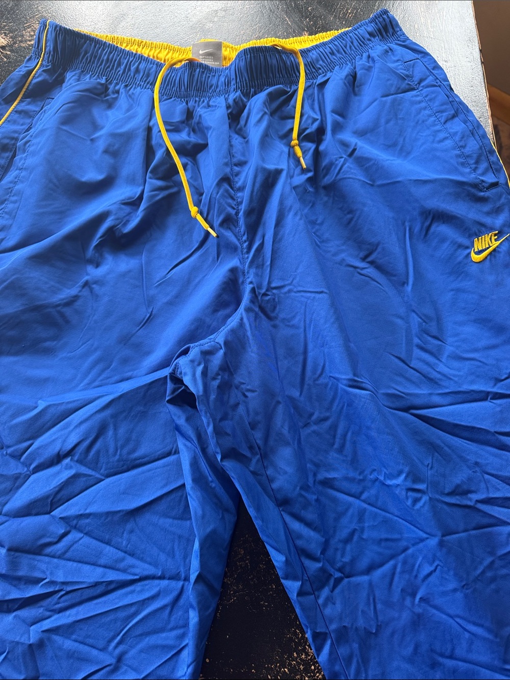 Nike Royal Blue Track Pants with Yellow Accents